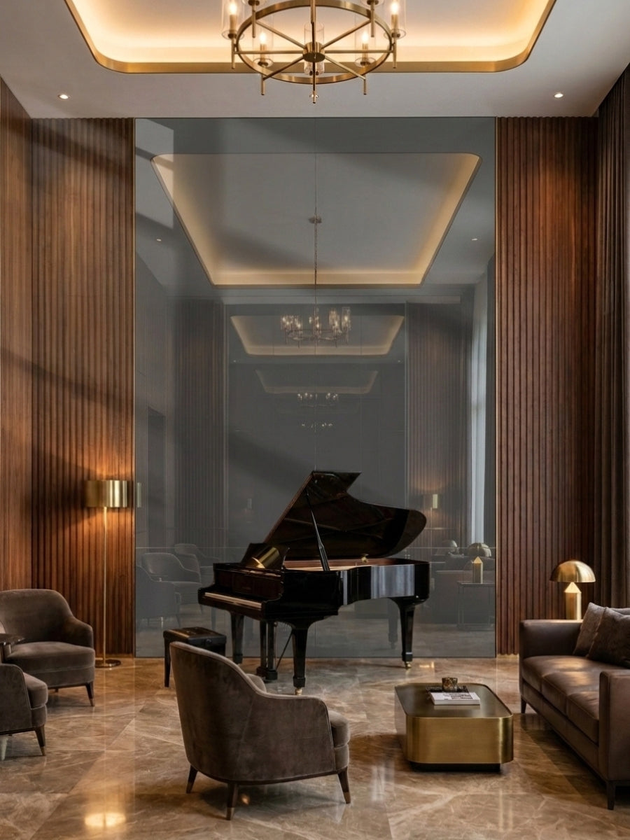 Large gray mirror wall panel behind a grand piano, framed by dark wood slatted panels