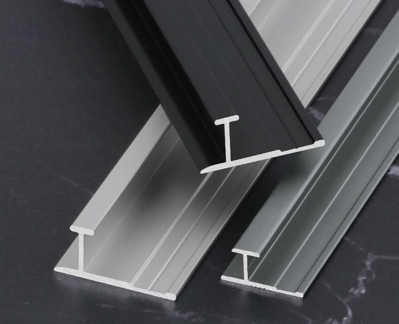Aluminum wall panel T trim profiles in black, silver, and gray finishes for panel joint finishing Main image