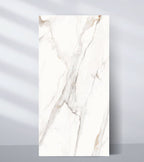 White marble wall panel with soft beige veining and polished luxury finish