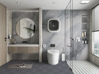 Modern bathroom with light grey marble wall panels and glass shower enclosure