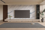 Modern living room TV wall with white marble wall panels and blue veining
