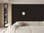 Walnut Ink WPC fluted wall panel installed as living room accent wall