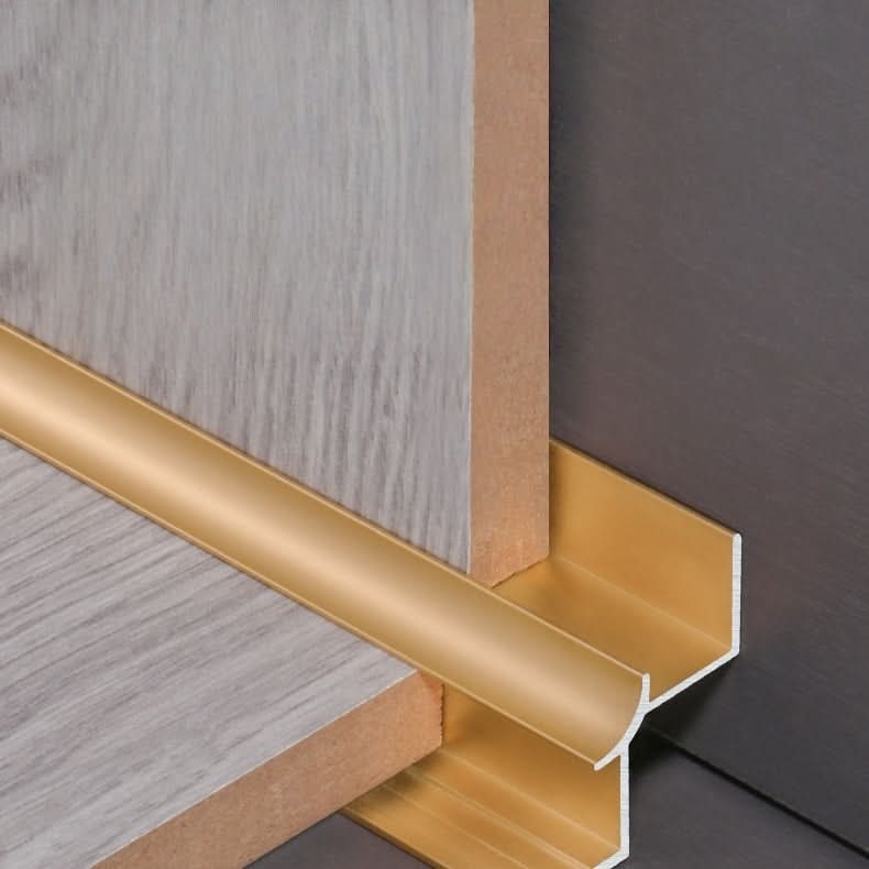 Gold aluminum wall panel inside corner trim installed between wood panels, durable metal edge strip for clean and stylish interior wall finishing