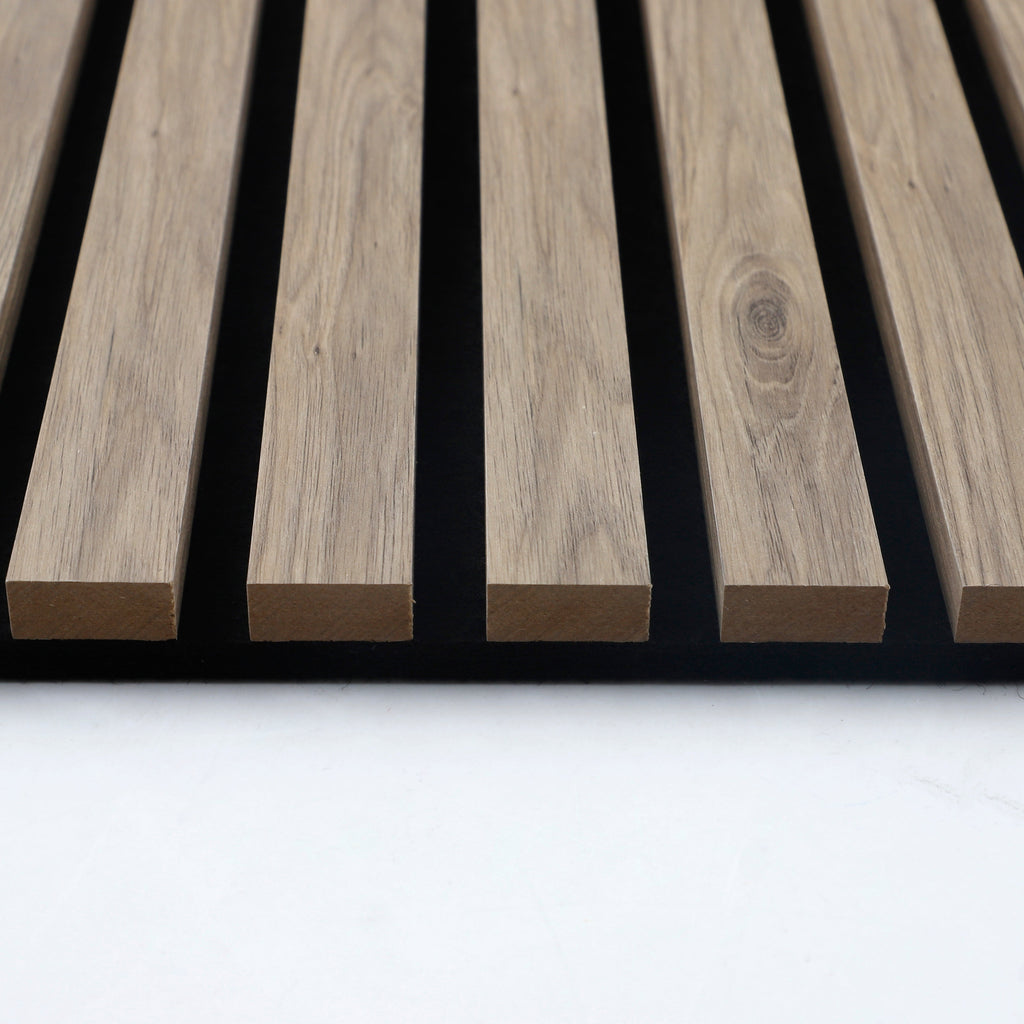 End view showing the wood slat profiles and black sound-absorbing panel backing