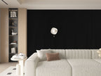 Luxe Noir black WPC fluted 3D wall panels accent wall in modern living room interior