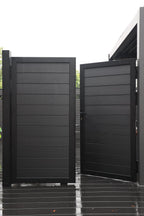 Black aluminum double privacy fence gate partially open with horizontal slat panels