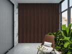Modern interior accent wall with dark smoky oak WPC fluted 3D wall panels