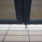 Composite double gate drop rod stopper at bottom hinge on aluminum frame