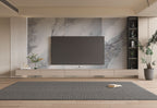 Modern living room TV wall with light grey marble wall panels