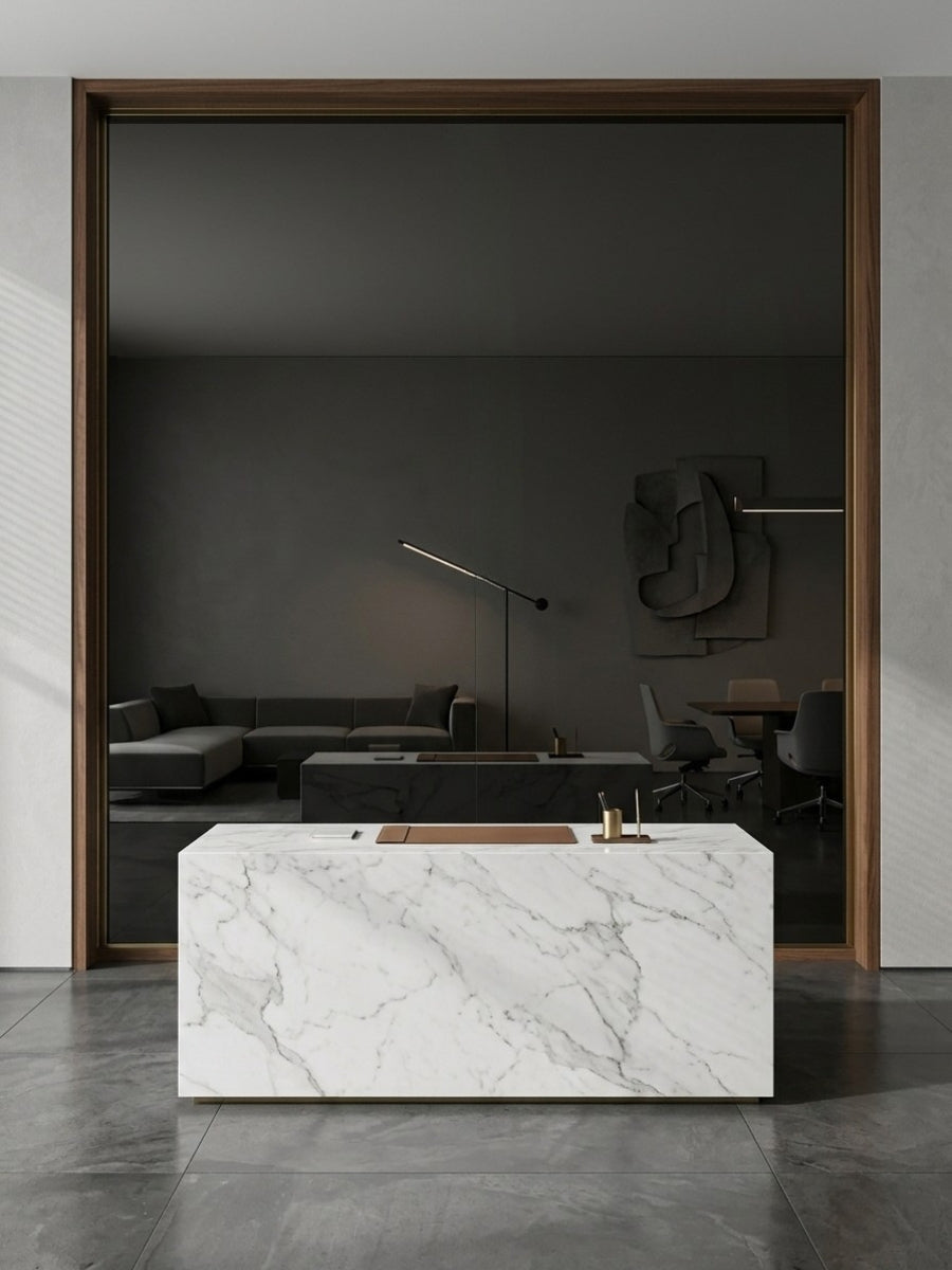 Large Black Mirror Wood Veneer Panel with dark wood frame behind a white marble reception counter