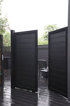 Black aluminum privacy fence double gate with modern full-panel design