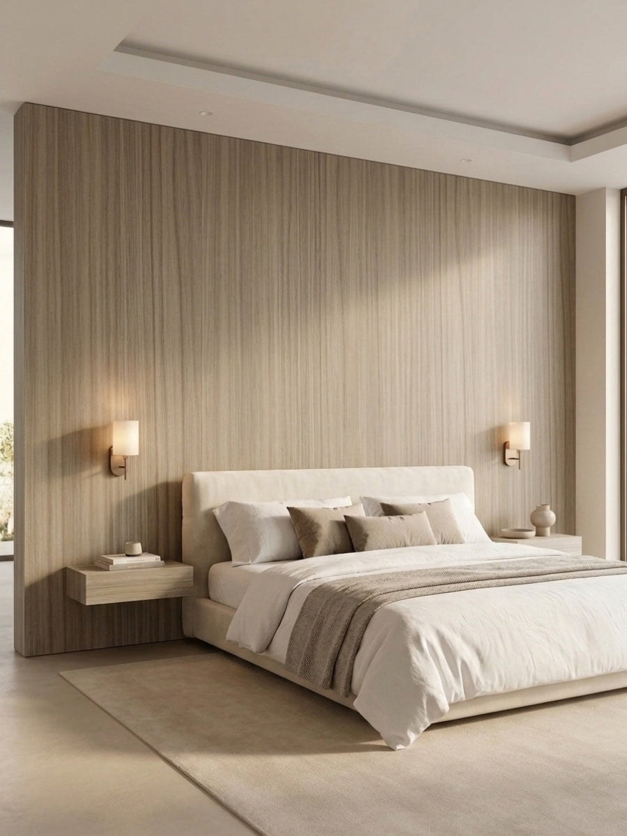 Ash wood veneer wall panels installed behind a bed in a modern neutral bedroom