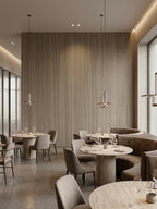 Vertical-grain ash wood veneer wall panels in an elegant restaurant interior