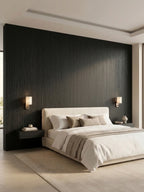 Blackwood veneer wall panels installed as a dark wood-grain feature wall behind a modern bed