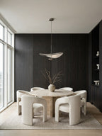 Blackwood veneer wall panels with smooth and fluted sections installed in a modern dining room