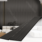 Black fluted wall panel installed as modern interior accent wall with vertical slat design