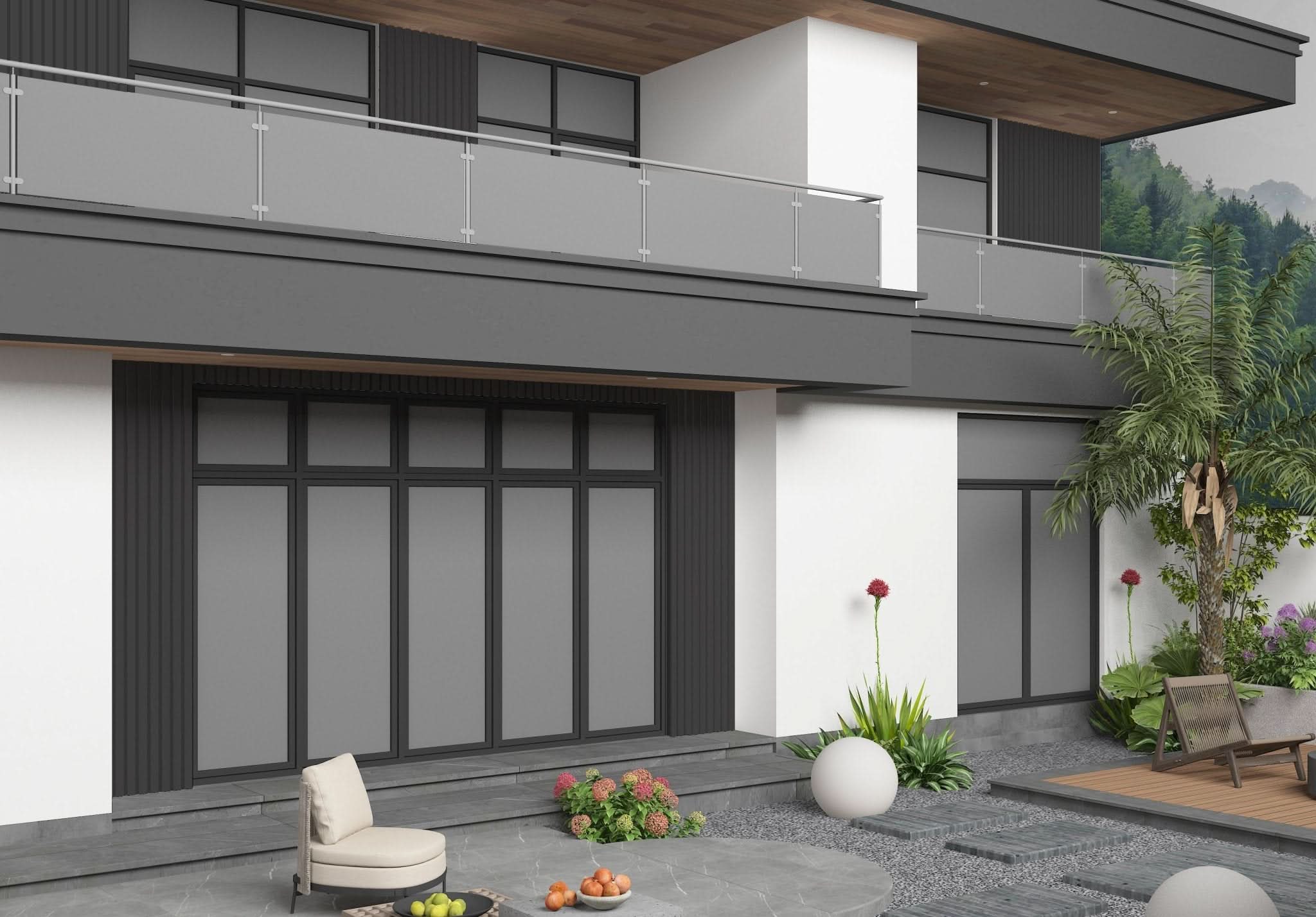 Modern home exterior with dark gray composite wide cladding panels and balcony