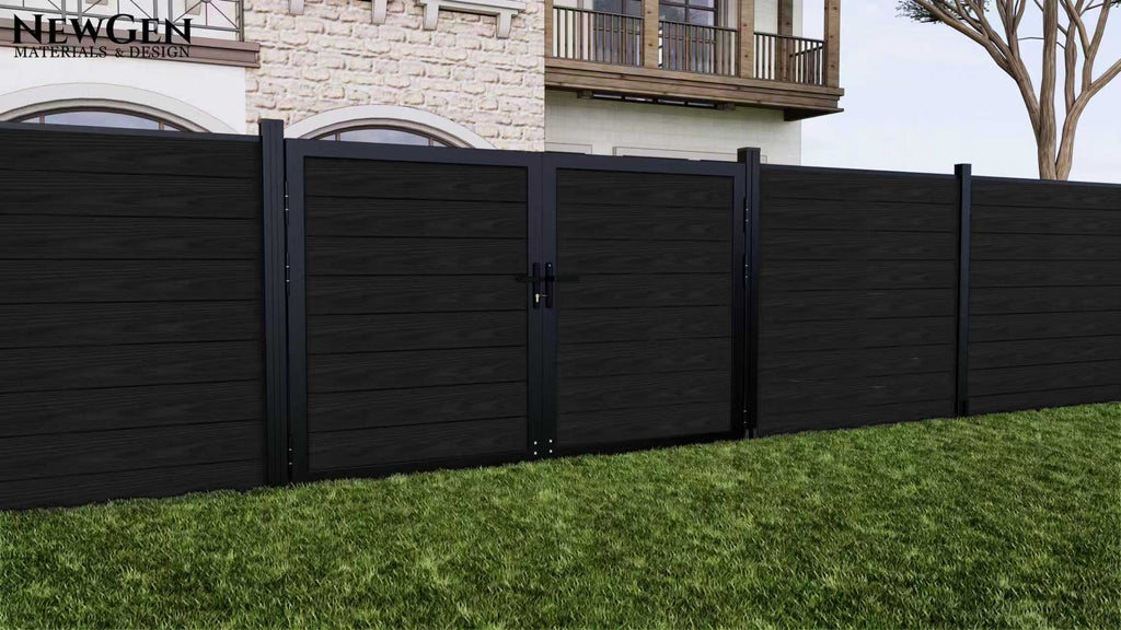 Black composite privacy fence with double gate and aluminum posts in a modern backyard