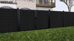 Black composite privacy fence with double gate and aluminum posts in a modern backyard
