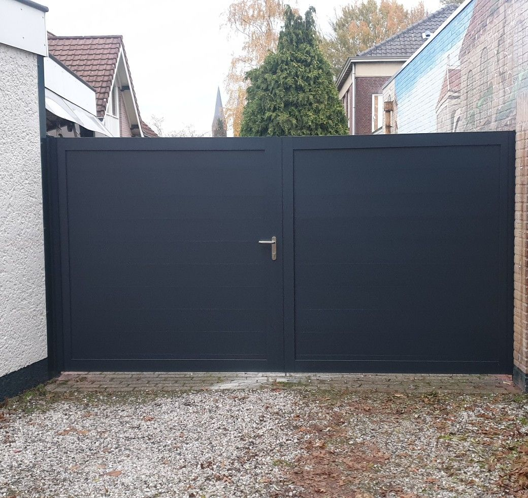 Black composite driveway gate with aluminum frame