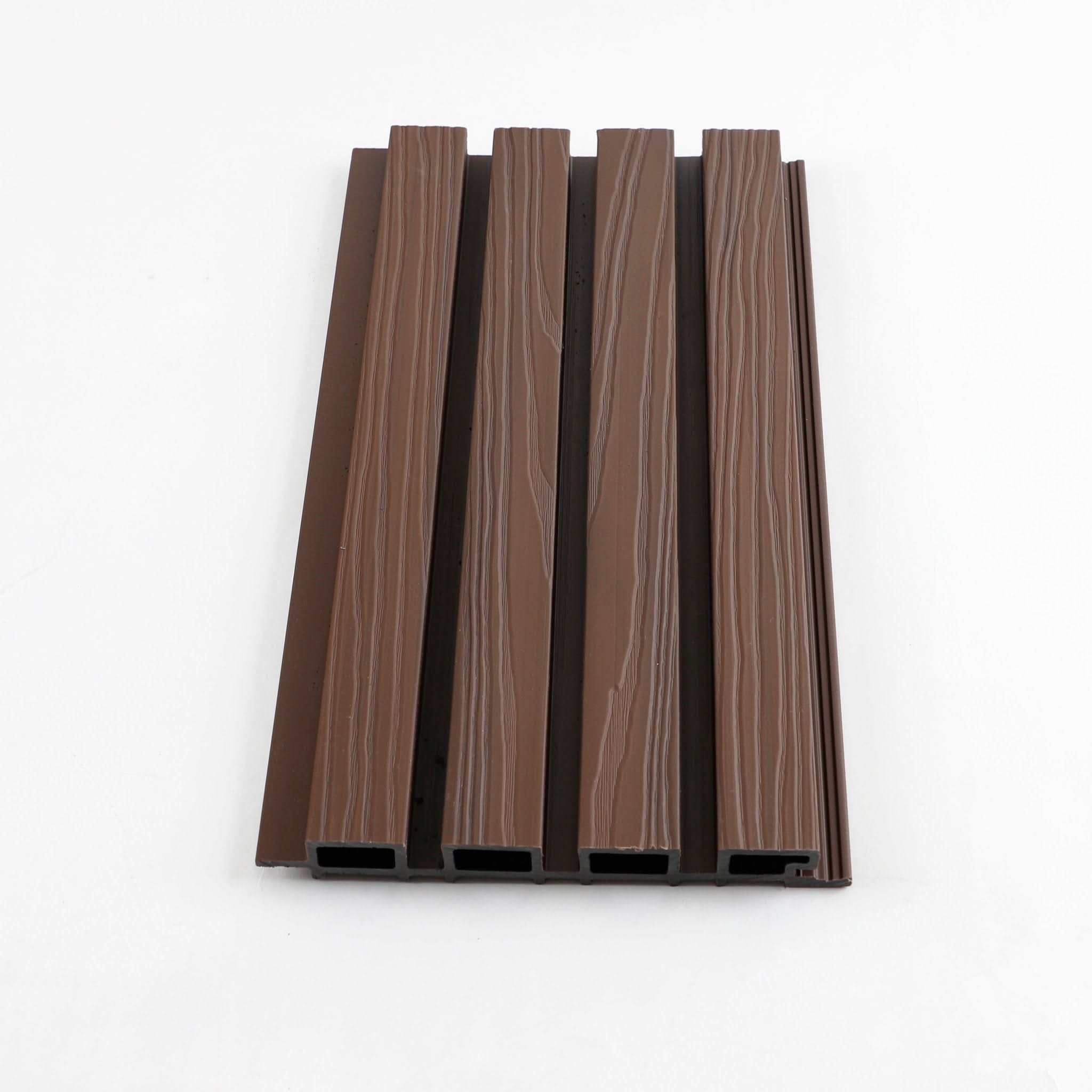 Brown WPC fluted wall panel with wood grain texture on white background