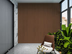 Interior feature wall with brown composite wide cladding panels