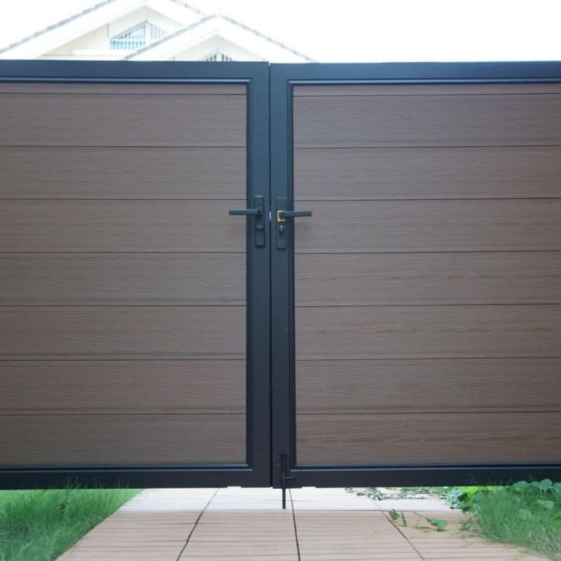Brown composite double driveway gate with aluminum frame and horizontal slats