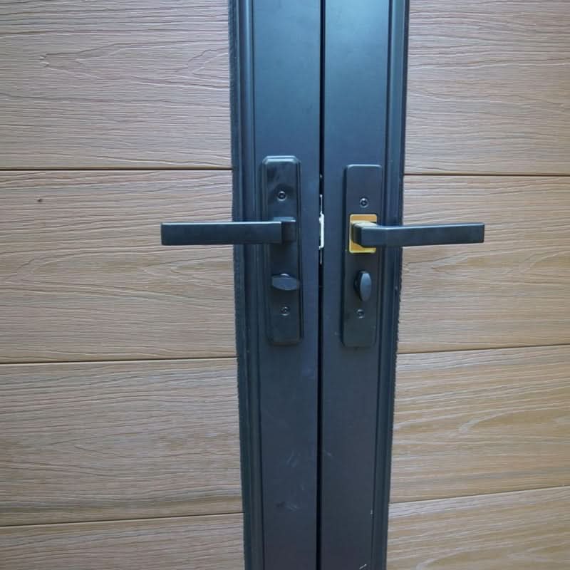 Composite double gate handle and lock hardware on aluminum frame