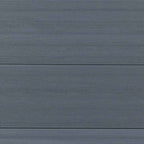 Close-up of light gray co-extrusion composite boards with fine horizontal grain