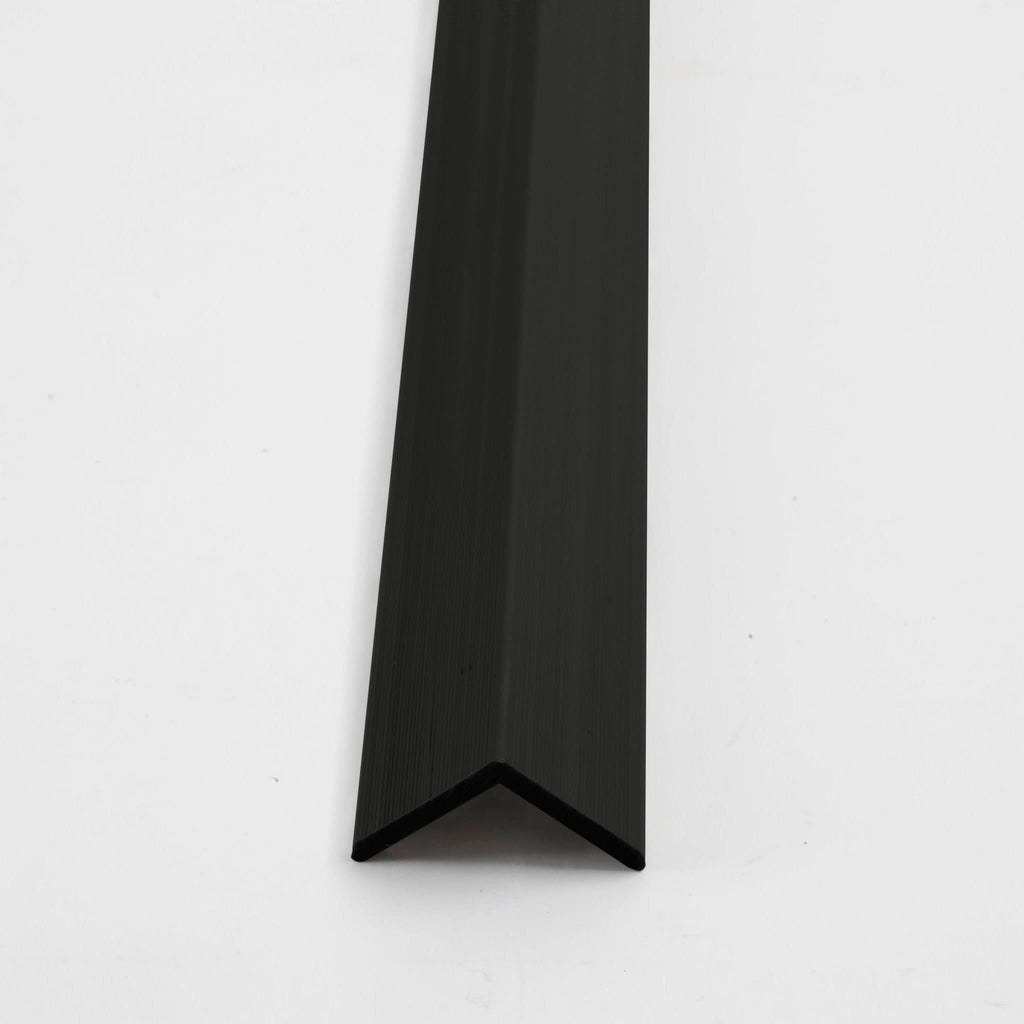 Dark gray composite exterior corner trim for wide cladding panels