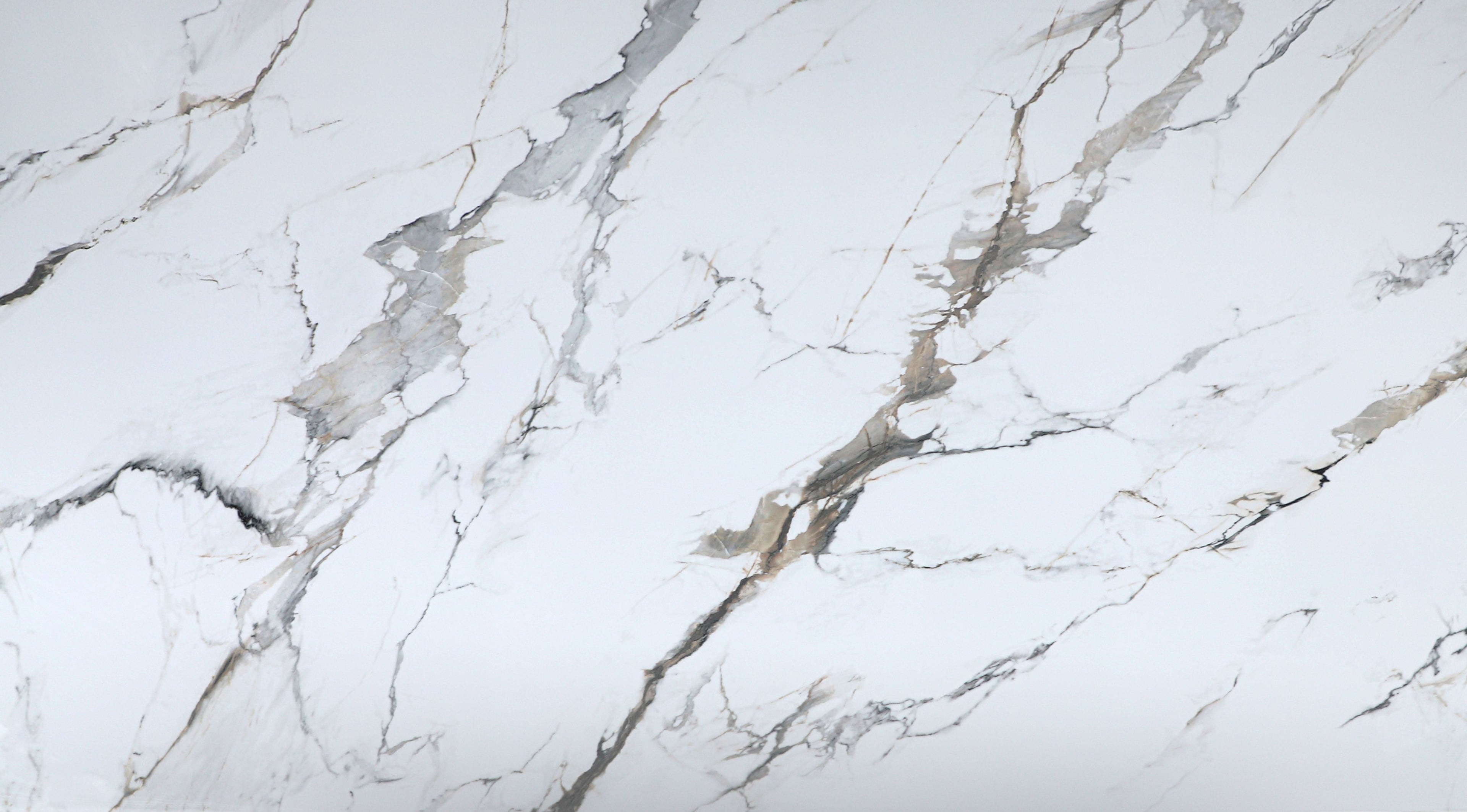 Moonlit Vein white marble PVC wall panel texture with soft gray and subtle gold veining