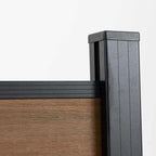 Brown walnut wood grain composite fence with black metal posts, durable and stylish, ideal for NJ homes.
