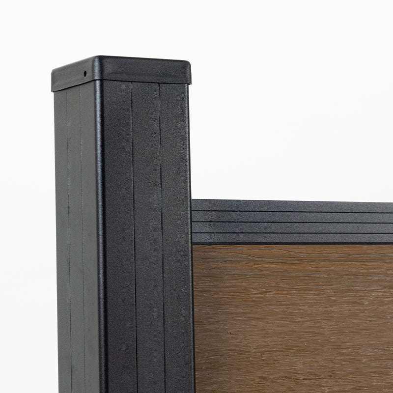 Black aluminum fence post with wood-grain composite privacy panel detail