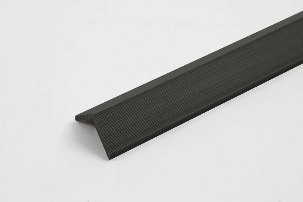 Black aluminum corner trim for wall panels with ribbed surface and clean edge finish