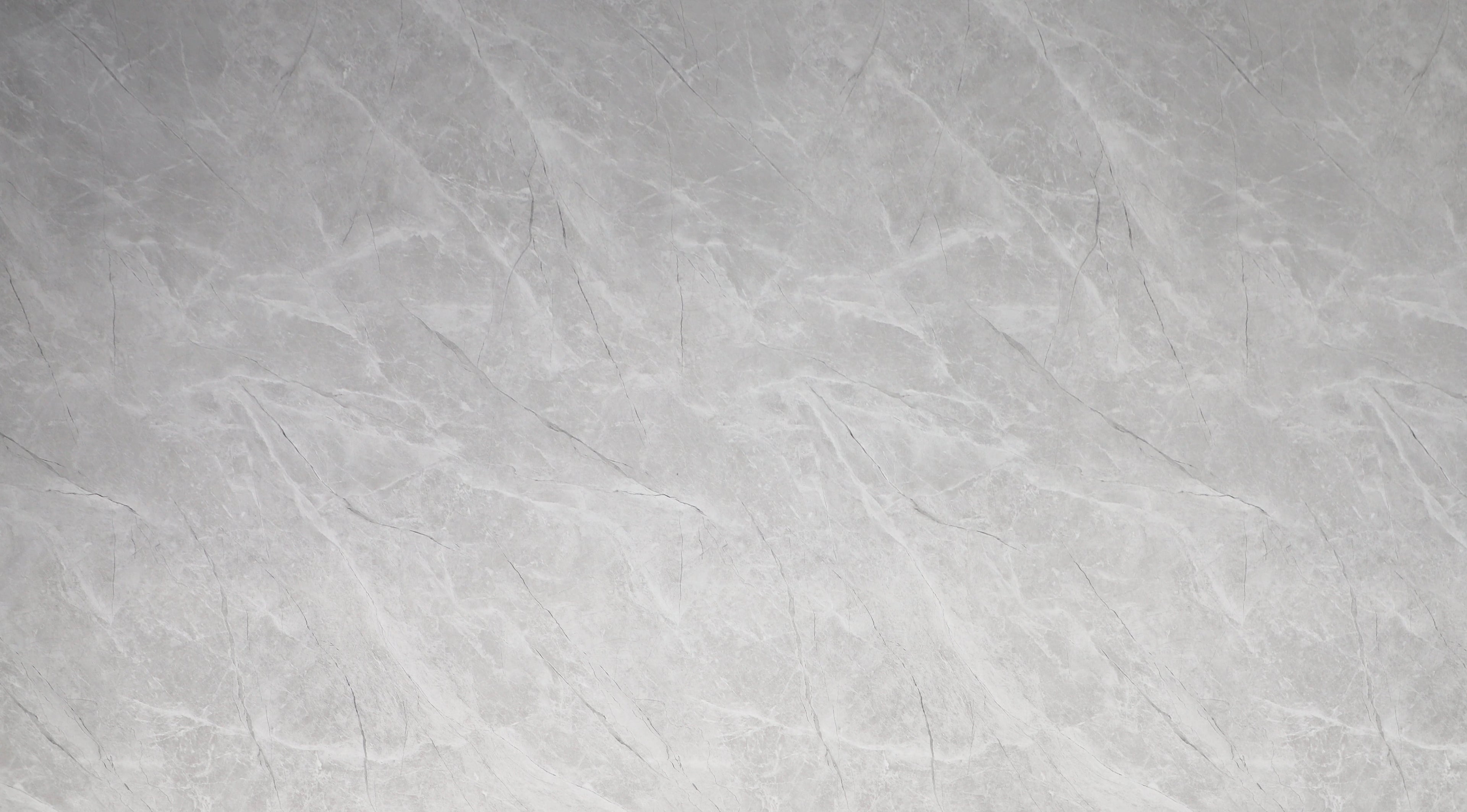 Serene Stone light gray PVC marble panel with soft natural stone texture