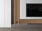 Modern TV feature wall with fluted wood panels and integrated vertical LED accent lighting