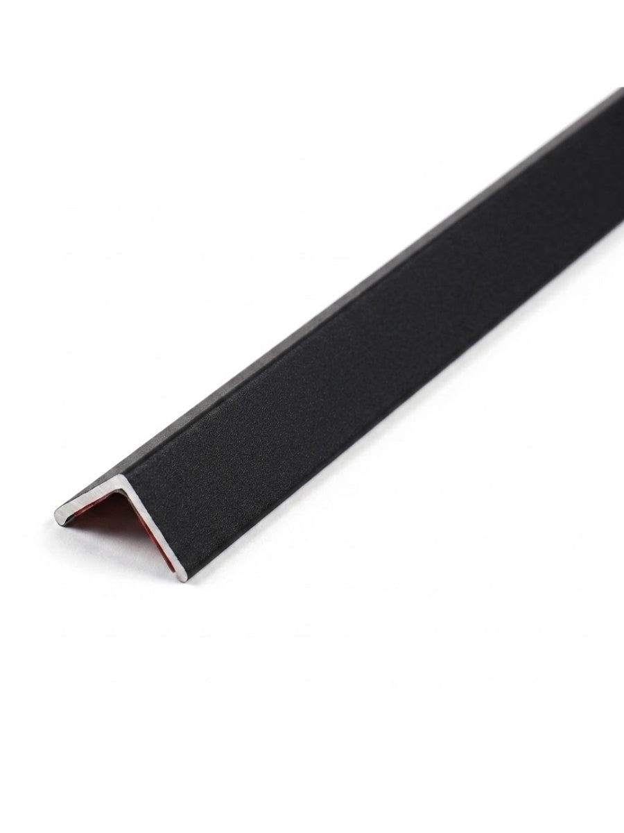 Solid black angled trim for acoustic and fluted wall panels
