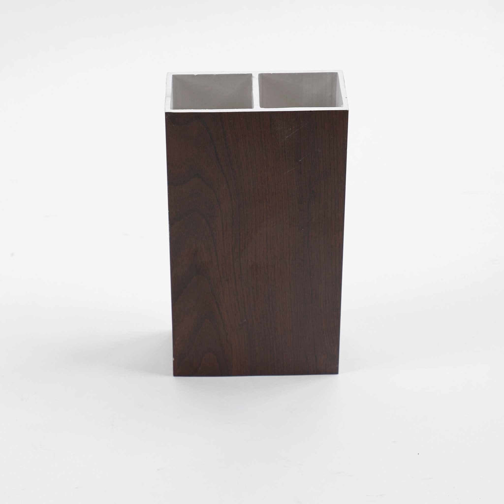 Brown WPC timber tubes, 4x2 inches, 9.5 feet long, with dark wood grain, ideal for NJ projects, durable and stylish.