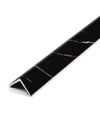 Black marble-look angled wall panel trim with fine gold veining