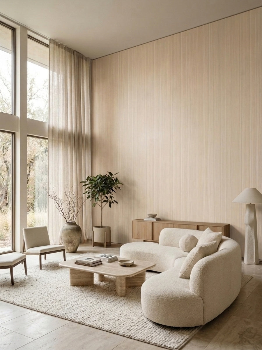 Nordic birch wood veneer feature wall in a bright living room with curved cream seating