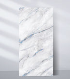 White marble veneer wall panel with soft blue veining