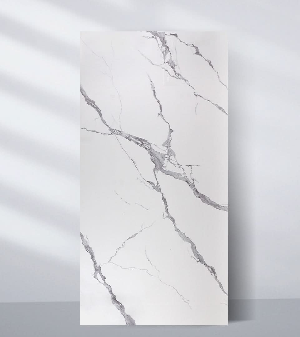 White marble PVC wall panel with soft gray veining and smooth polished finish