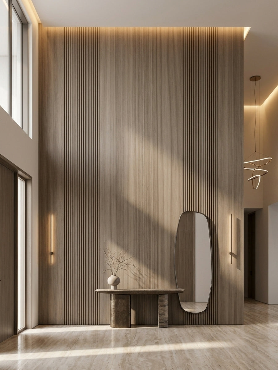 Floor-to-ceiling Royal Oak wood veneer panel with vertical grooves, warm lighting, console table, and oval mirror