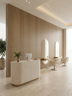 Royal Oak wood veneer panels installed behind a salon reception desk and arched styling mirrors