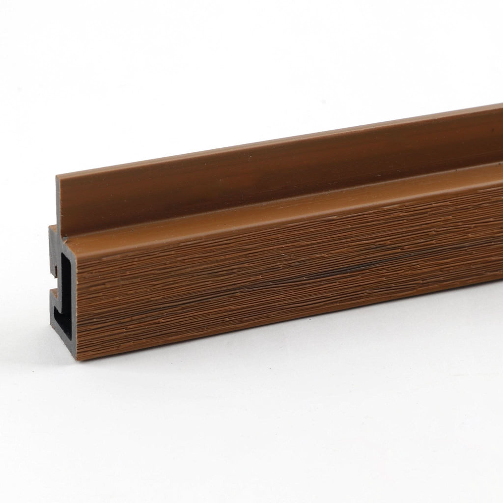 Brown composite trim profile with wood grain texture and integrated mounting channel