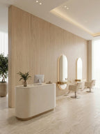 White oak veneer feature wall with arched mirrors in a bright salon reception area