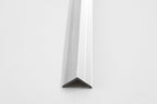 Silver aluminum corner trim for wall panels with clean angled edge finish