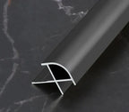 Black aluminum wall panel outside corner trim profile showing cross-section design, durable metal edge strip for modern interior wall panels