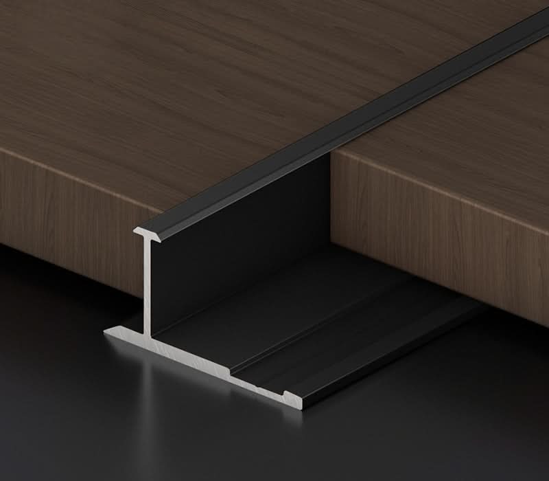 Black aluminum wall panel T trim installed between panels for clean joint and edge finishing