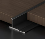 Black aluminum wall panel T trim installed between panels for clean joint and edge finishing